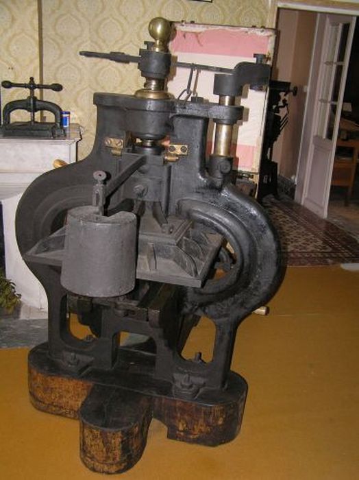 machine à imprimer à encre liquide (presse à barreau)