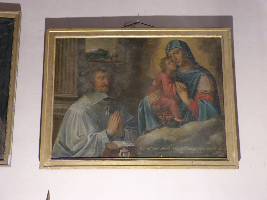 tableau : Chanoine en prière devant la Vierge à l'Enfant