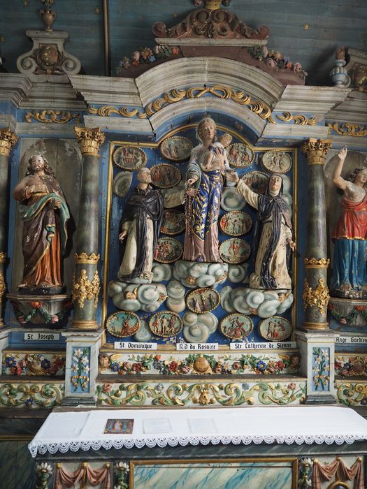 retable, statues : Sainte Catherine de Sienne, Saint Dominique, Vierge, Saint Joseph et l'Ange gardien