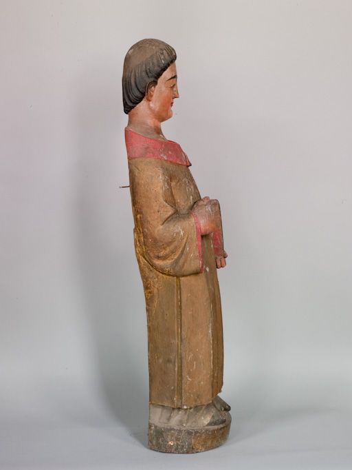 statue : Saint tenant un livre, profil droit - © Ministère de la Culture (France), Conservation des antiquités et des objets d’art de la Haute-Garonne – Tous droits réservés 