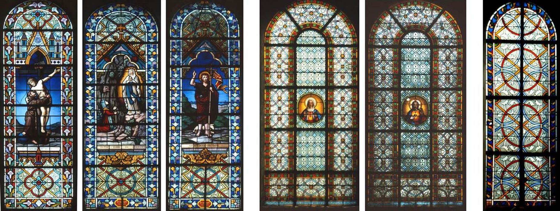 verrières (grisailles) : Saint François d'Assise recevant le corps du Christ (baie 0), Apparition de la Vierge de Lourdes (baie 1), Saint Jean Baptiste (baie 2), Sacré-Coeur de la Vierge (baie 3), Sacré-Coeur de Jésus (baie 4)