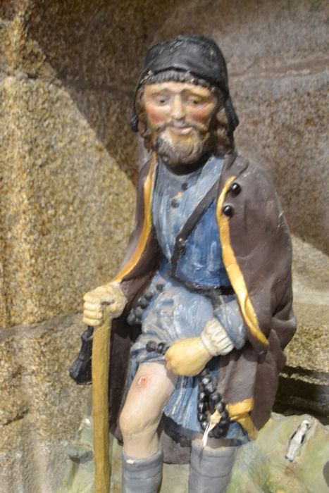 groupe sculpté : saint Roch et un donateur, vue partielle