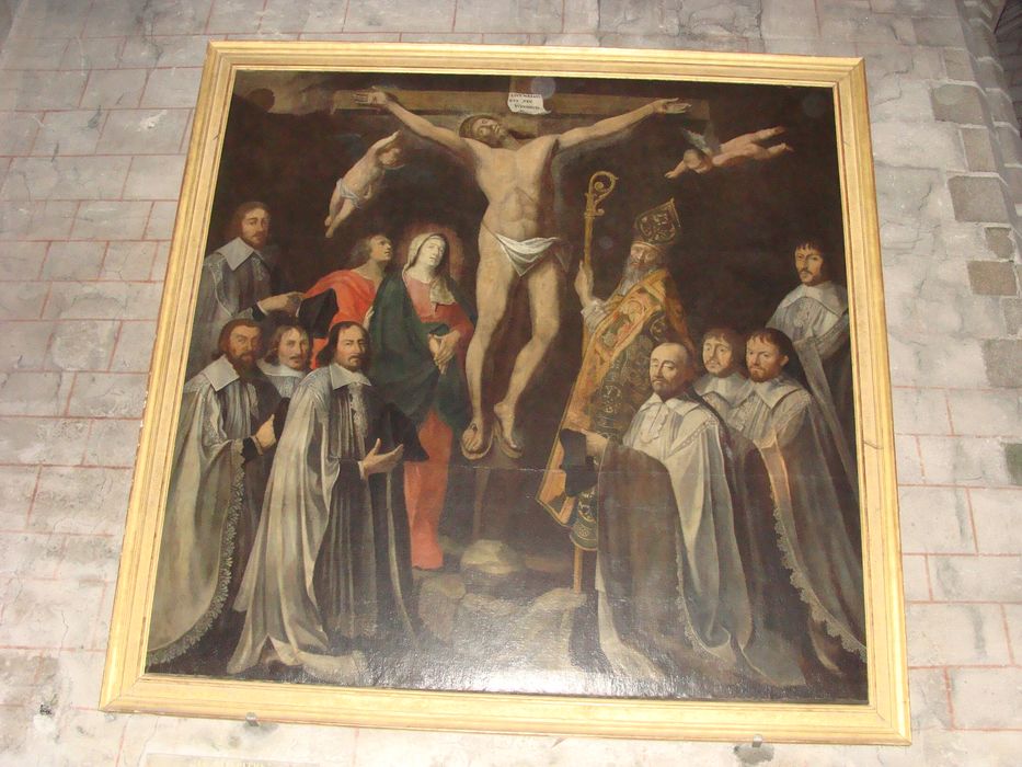 tableau : le curé Prévot et huit chanoines de la collégiale devant le Christ crucifié