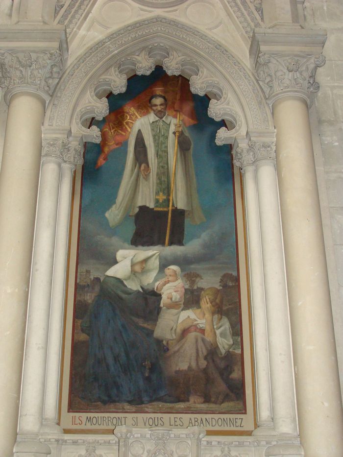 tableau : saint Vincent de Paul et une religieuse faisant la charité