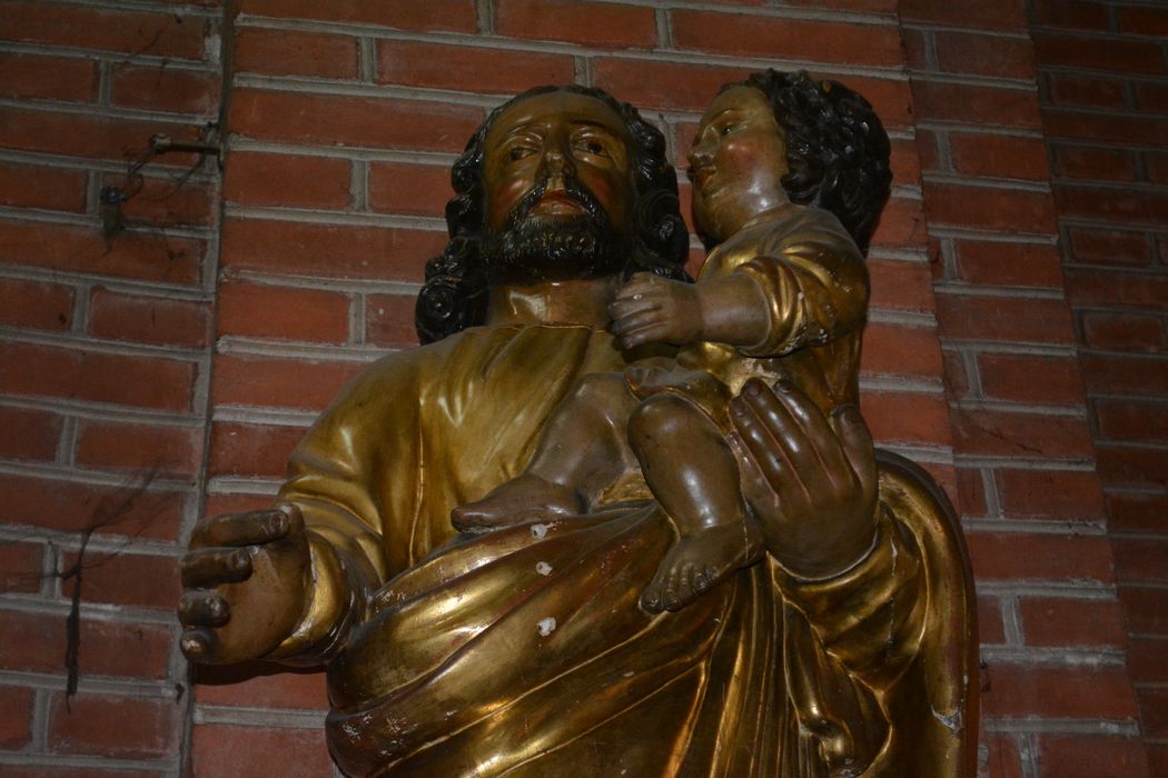 statue : saint Joseph et l’Enfant, vue partielle