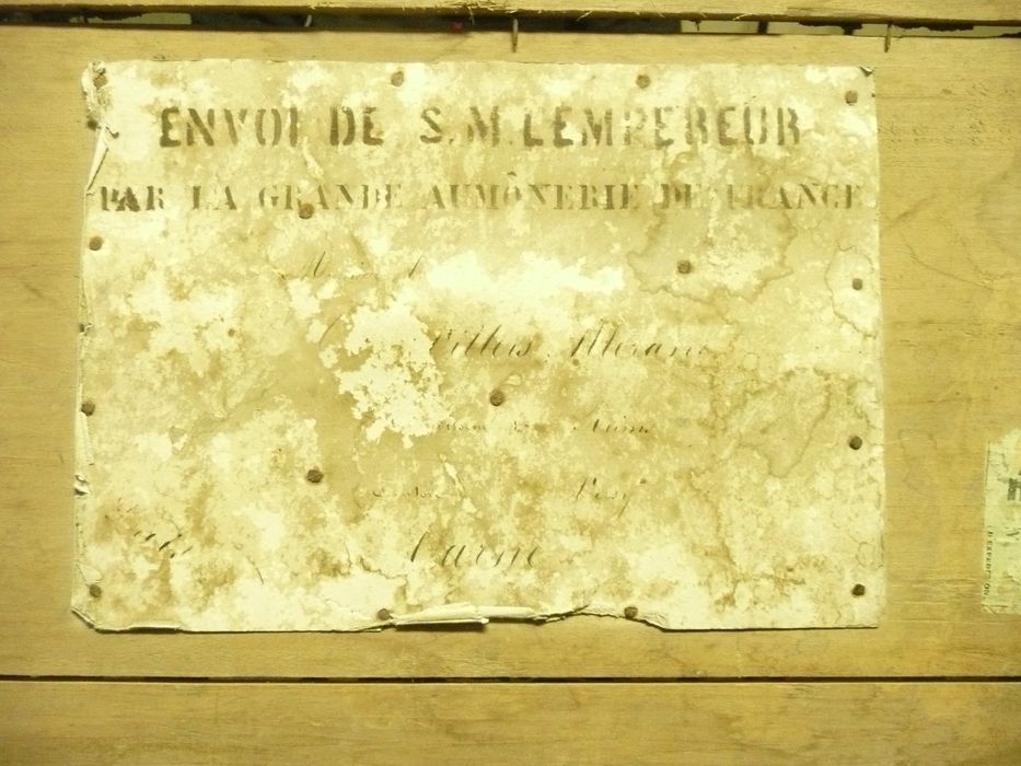 garniture de dais de procession, détail d’une étiquette avec inscription 