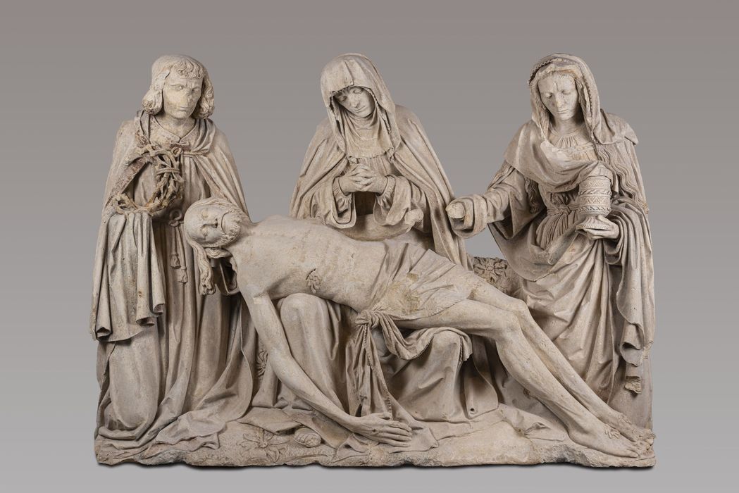 groupe sculpté dite Pietà de Saint-Marcoul : le Christ pleuré par la Vierge, saint Jean et Madeleine - © Ministère de la Culture (France), Musée Saint-Remi de Reims - Tous droits réservés