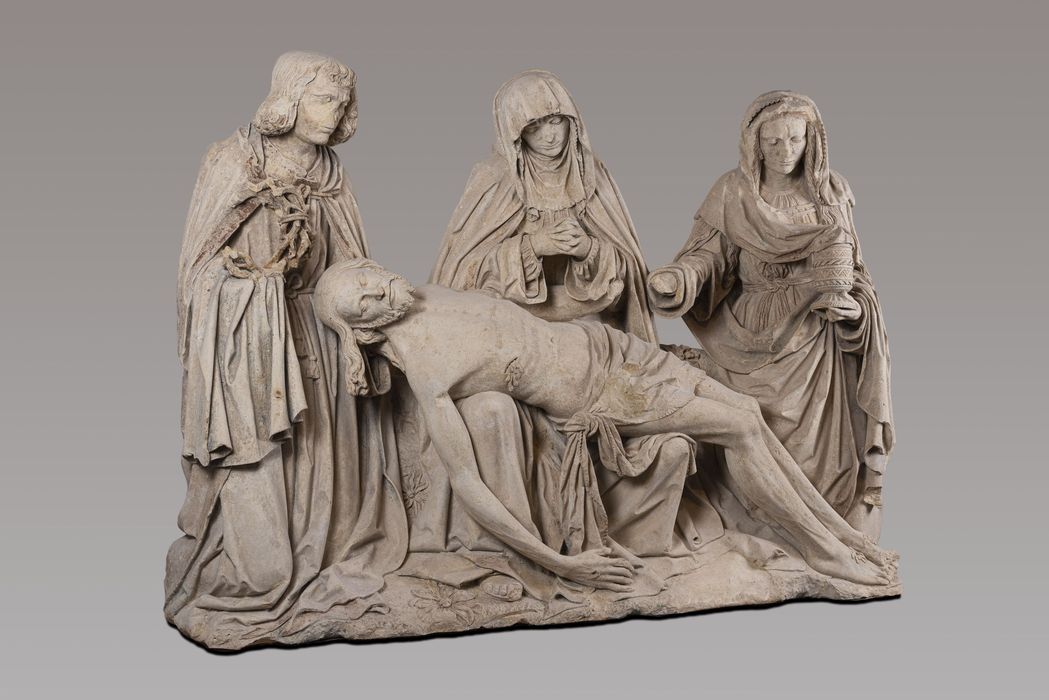 groupe sculpté dite Pietà de Saint-Marcoul : le Christ pleuré par la Vierge, saint Jean et Madeleine - © Ministère de la Culture (France), Musée Saint-Remi de Reims - Tous droits réservés