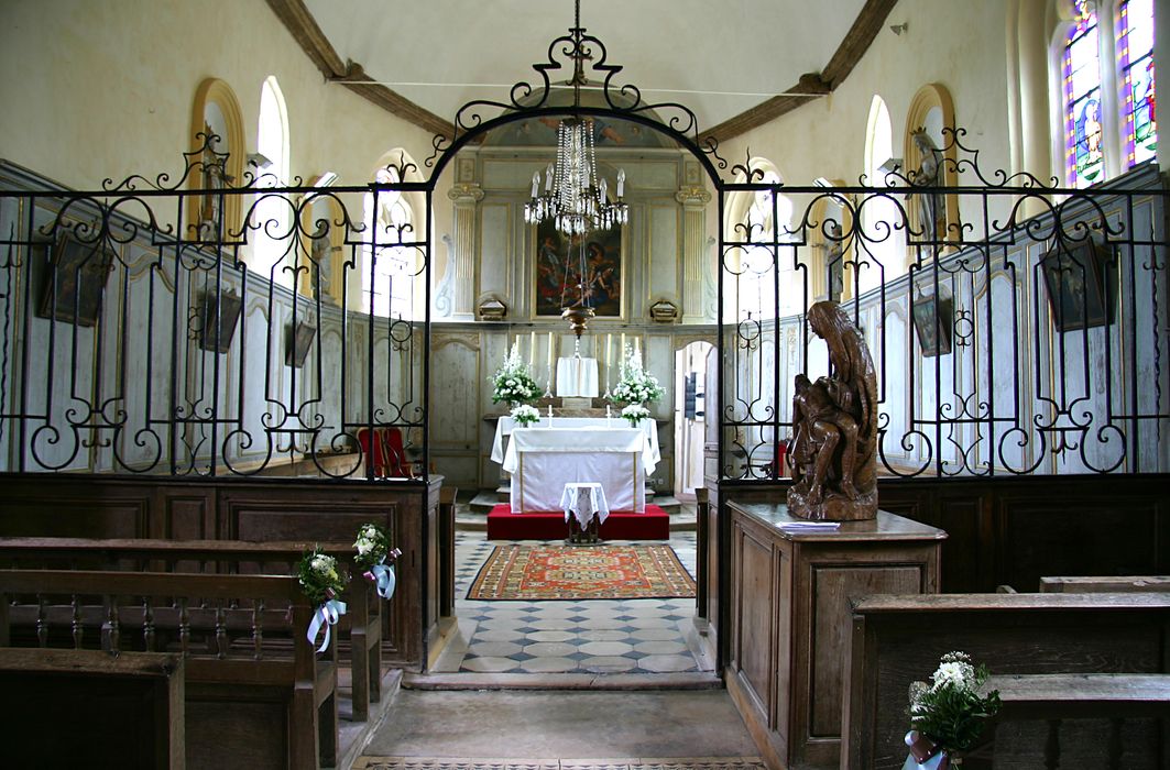 Retable et sa toile, lambris de revêtement (boiseries) et clôture de choeur