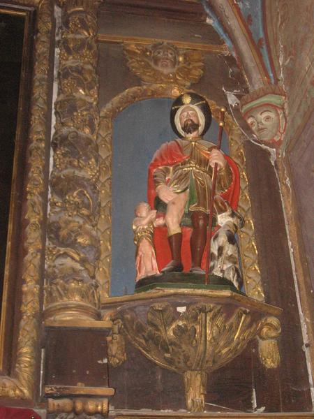 retable du maître-autel : vue générale de la statue située à droite : saint Roch