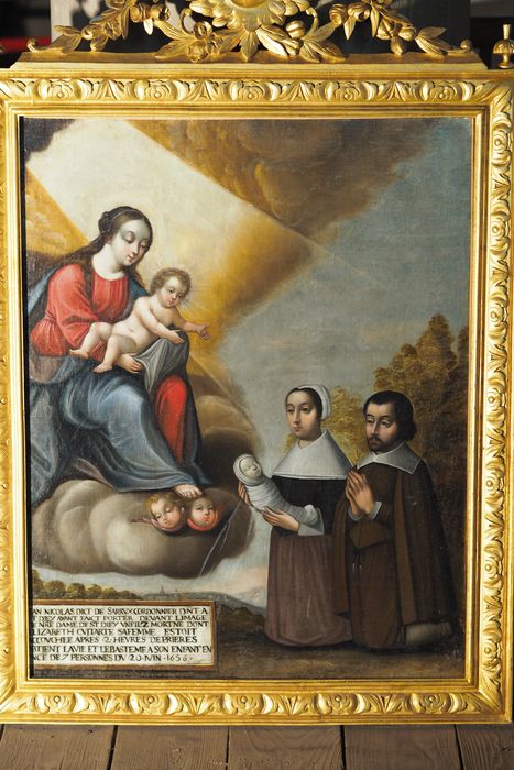 tableau : Deux personnages aux pieds de la Vierge