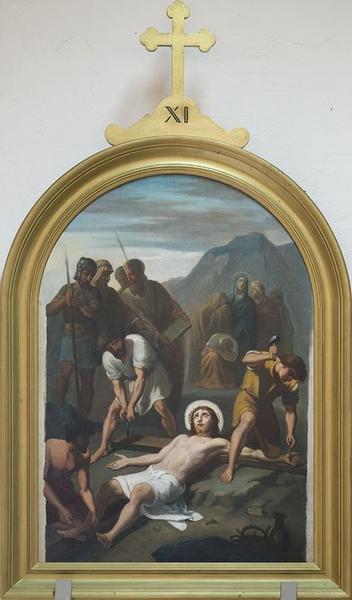 station du chemin de croix : Jésus est cloué sur la croix
