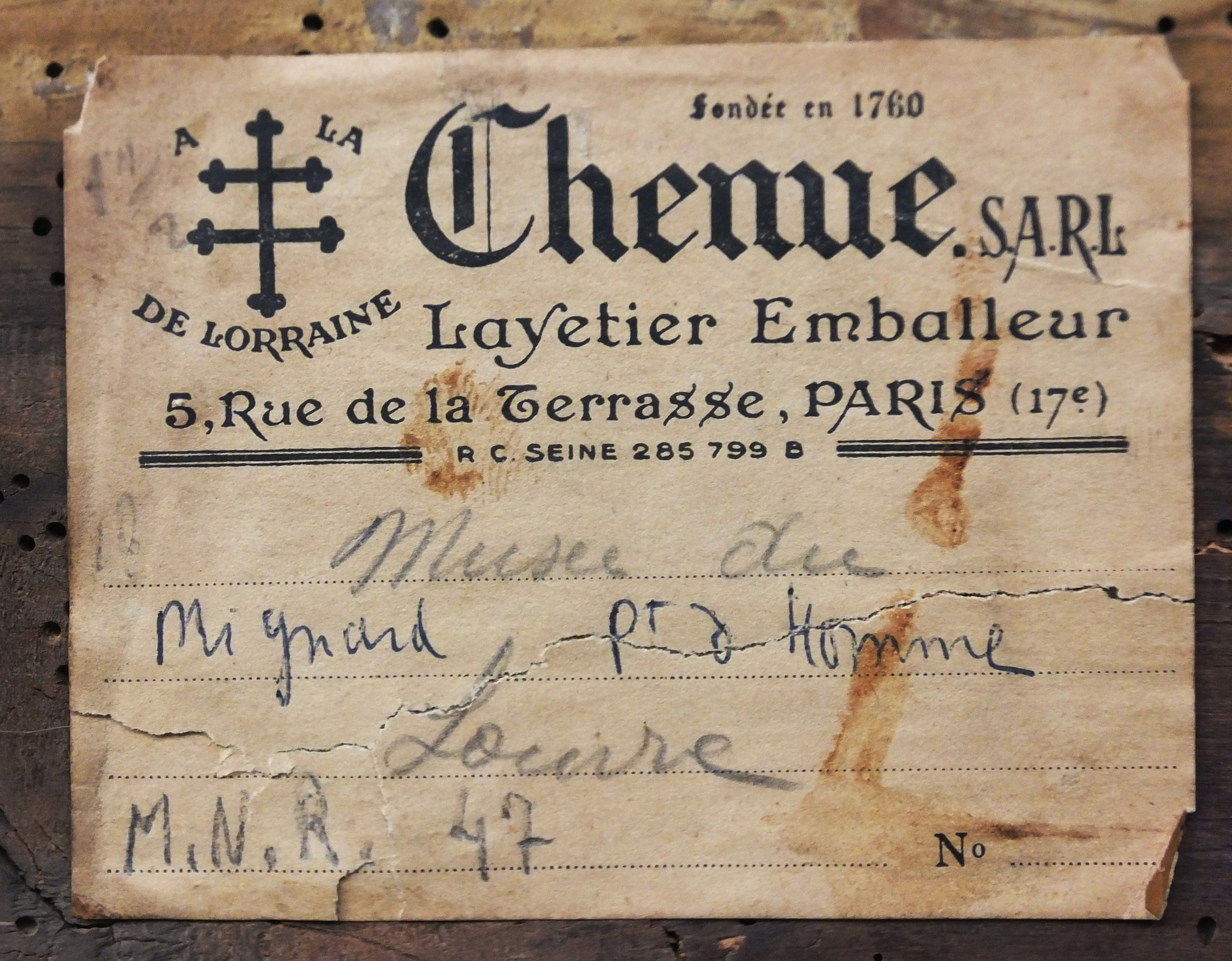 mnr/MNR00047/MNR47_CopyrightMuseeDuLouvre_detail-etiquette-au-revers-du-cadre.jpg