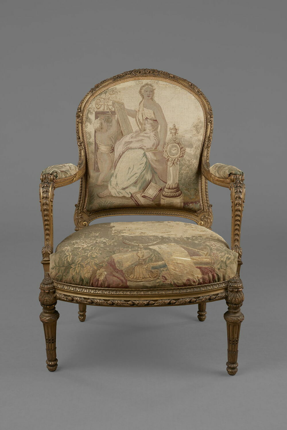 Fauteuil de bois sculpté et doré style Louis XVI